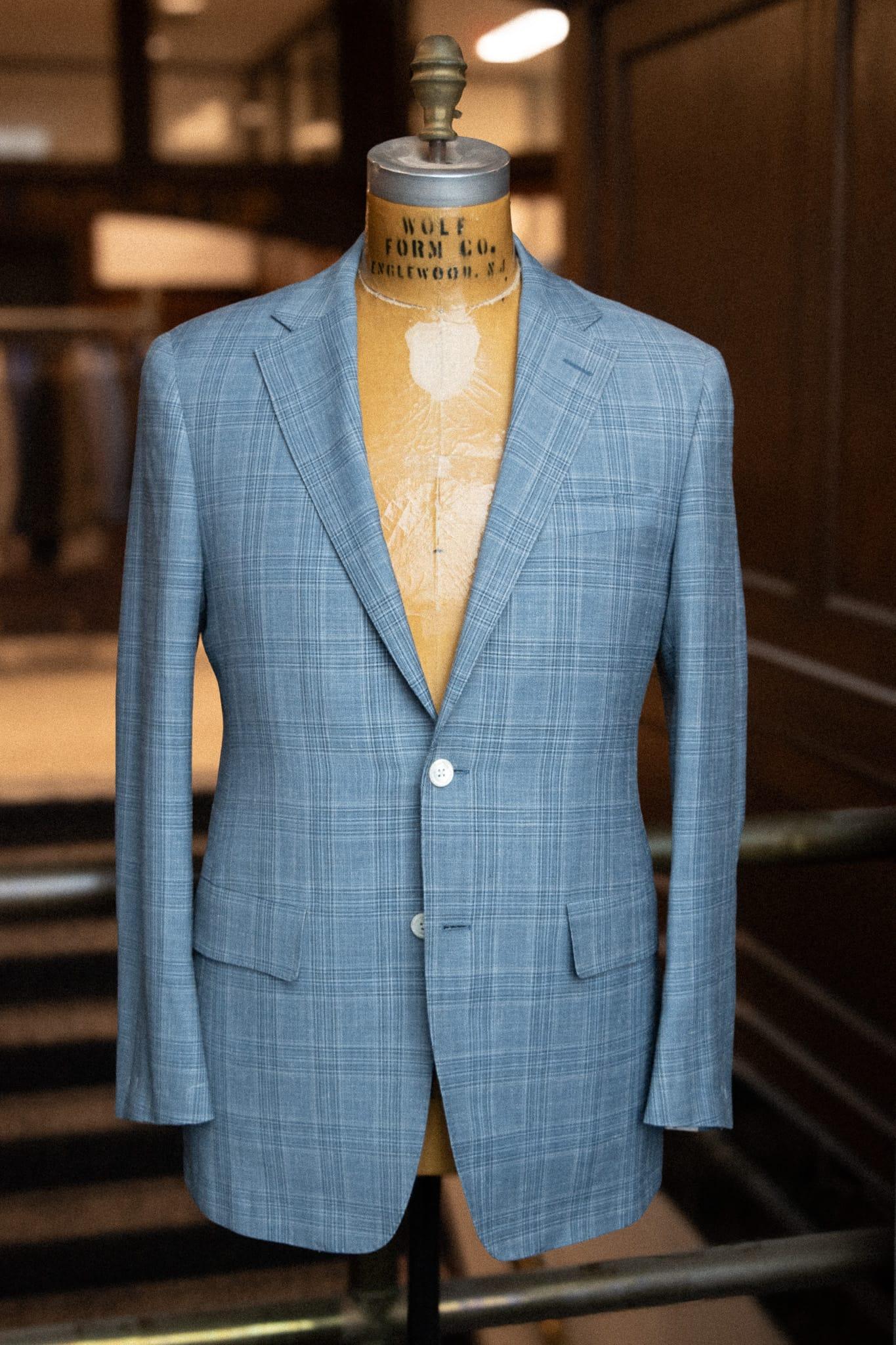 Summit sport coat in light blue glen plaid on a tailor’s bust form