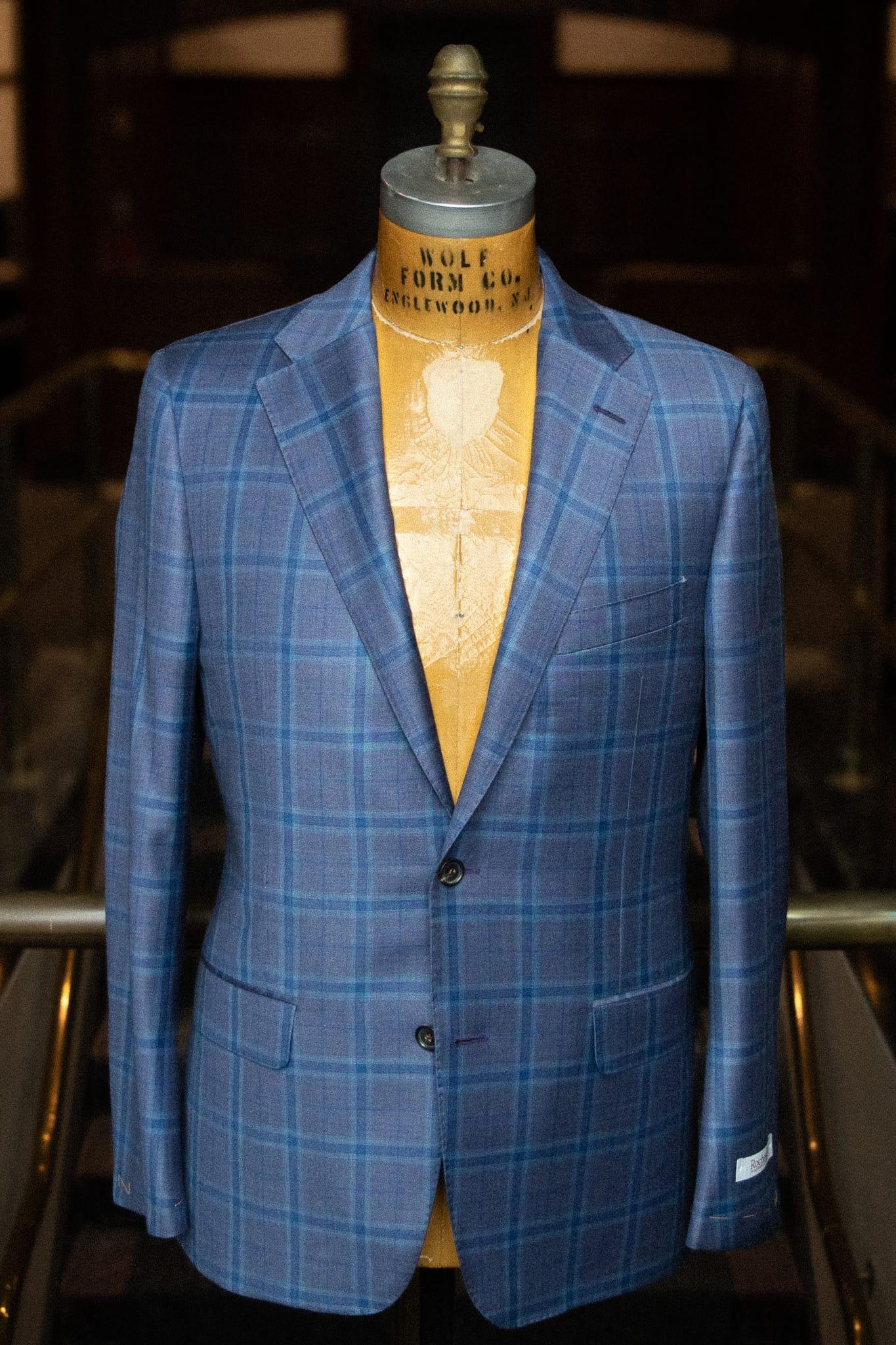 Beacon II sport coat in dark blue windowpane on a tailor’s bust form