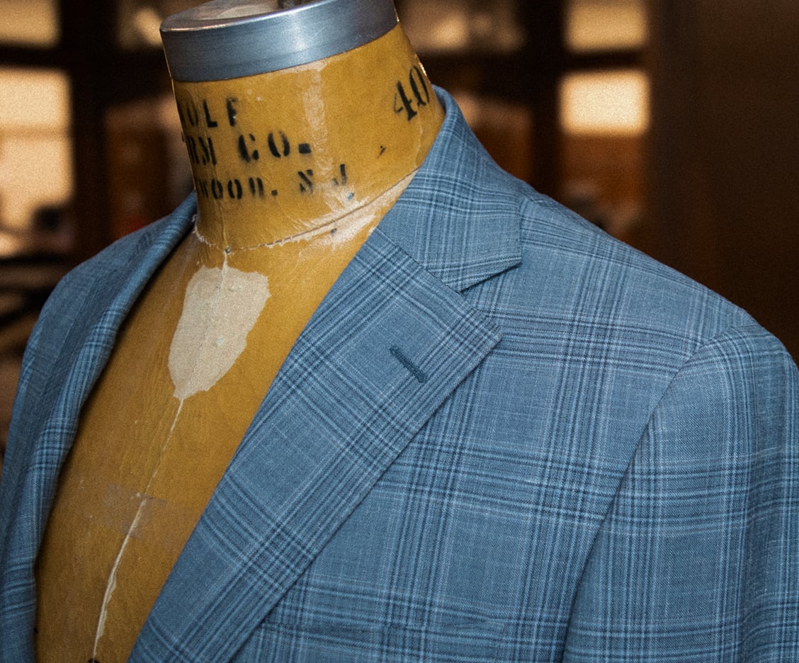 Summit gray-blue plaid jacket on a Wolf Form bust form