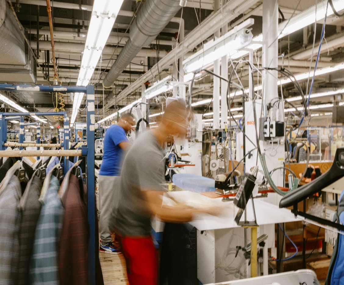 Tailors at work on the factory floor at Rochester Tailored Clothing